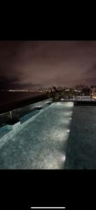 Bazén v ubytování Flat Pé na areia com Banheira Privativa nebo v jeho okolí