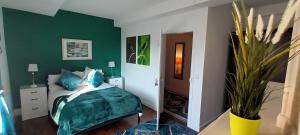 En eller flere senge i et værelse på Place of the Goddess