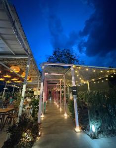a lit up walkway with lights in a building at Hotel 5 HILLS DRAGASANI in Drăgăşani