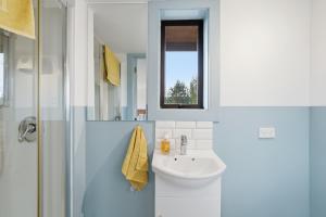 a bathroom with a sink and a shower at The Wee Glen - Peaceful Country Retreat 2 bed in Bennetts +14 photos