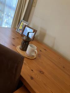 Příslušenství pro přípravu čaje a kávy v ubytování Green House Tsukuba Studio