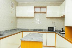 Η κουζίνα ή μικρή κουζίνα στο ATLANTICBLU Recreation and Apartment