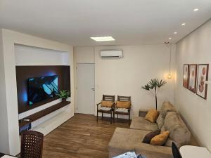 TV/trung tâm giải trí tại Apartamento lindo e Espaçoso