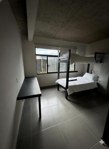 En eller flere senge i et værelse på Casa mansa hostel