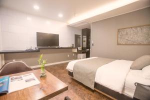 TV a/nebo společenská místnost v ubytování Major Hotel 2