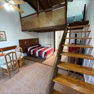 Giường trong phòng chung tại Bungalows Amancay