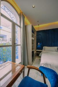 Postel nebo postele na pokoji v ubytování Résidence Hoteliére Chez Aziz