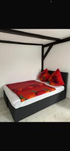 Ένα ή περισσότερα κρεβάτια σε δωμάτιο στο 1 Zimmer Häuschen