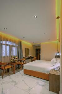 Postel nebo postele na pokoji v ubytování Résidence Hoteliére Chez Aziz + 67 fotografií