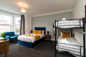 En eller flere senge i et værelse på The Linden Leaf Rooms