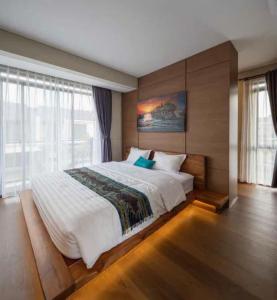 Giường trong phòng chung tại Nyaman Wangi Villa, Kota Baru Parahyangan