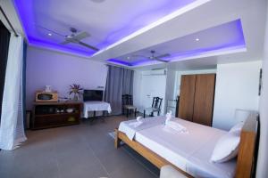 Postel nebo postele na pokoji v ubytování Holiblue + 1 fotografie