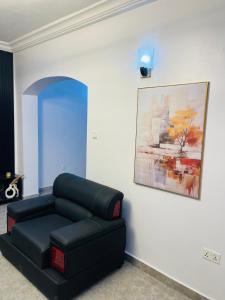 Posezení v ubytování Sam Apartment + 3 fotografie