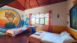 Giường trong phòng chung tại El Dulce Reposo