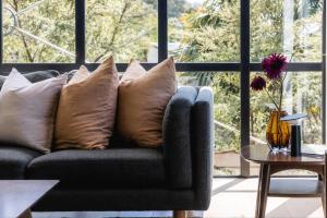 Posezení v ubytování The Palm Beach Treehouse