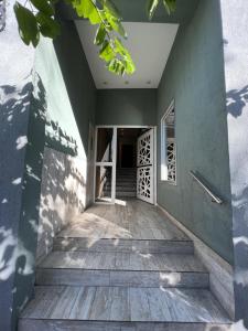 a hallway of a house with a wooden floor at Dpto Temporario 1 - Corrientes - PQ ALQUILERES TEMPORARIOS in Corrientes