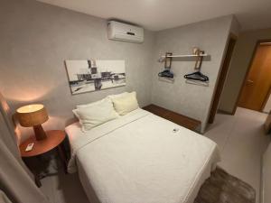 Giường trong phòng chung tại Malawi Beach Resort - Flat SKY +98 ảnh
