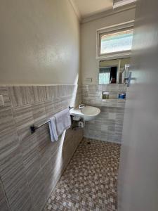 Koupelna v ubytování Great Western Motel + 41 fotografií