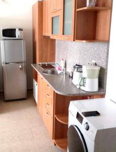 Kuchyň nebo kuchyňský kout v ubytování BEACH APARTMENt 17