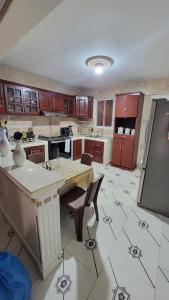 Kuchyň nebo kuchyňský kout v ubytování Descansa sin prisas a minutos del Aeropuerto