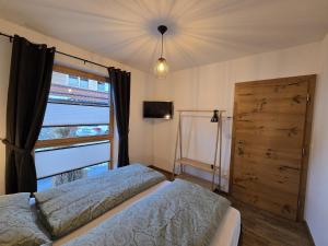 Giường trong phòng chung tại Tauernapart II