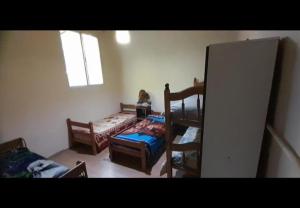 En eller flere senge i et værelse på La Lujanense