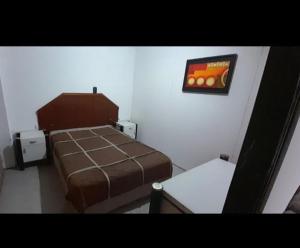 En eller flere senge i et værelse på La Lujanense