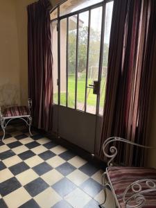 Et opholdsområde på Casa Quinta en Colonia Caroya + 5 billeder