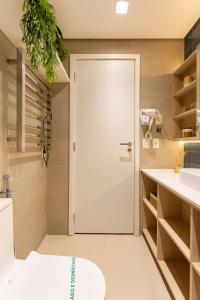 Koupelna v ubytování Pé na Areia 1 min da Praia Piscina com Vista