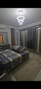 Ένα ή περισσότερα κρεβάτια σε δωμάτιο στο قلب النيل