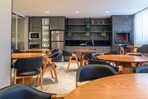 Køkken eller tekøkken på Apartamento com Vista Mar e Piscina