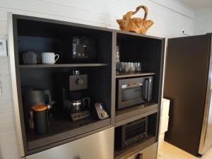 Kuchyň nebo kuchyňský kout v ubytování Lucent NISEKO