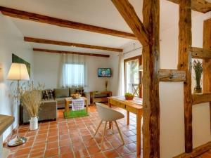 Et tv og/eller underholdning på Holiday apartment in Lübben with barbecue + 13 billeder