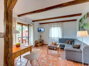 Et opholdsområde på Holiday apartment in Lübben with barbecue