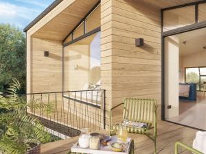 Balkón nebo terasa v ubytování Holiday home treehouse Weissenhäuser Strand