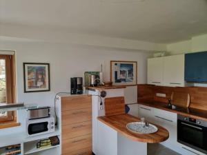 Køkken eller tekøkken på Holiday home Ammergau Alps