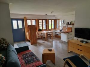 Et tv og/eller underholdning på Holiday home Ammergau Alps