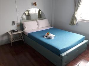 Postel nebo postele na pokoji v ubytování Anodard Hotel