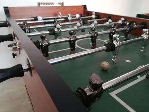 a row of billiard tables with a ball on them at Villa in Korni with swimming pool in Kornić +53 photos