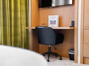 TV a/nebo společenská místnost v ubytování Symons Block Suite 6