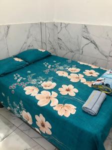 En eller flere senge i et værelse på Hostal Bellettini