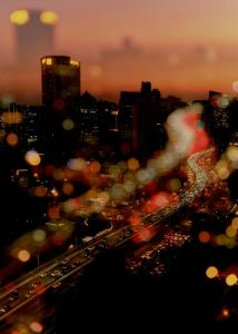 a city skyline at night with cars at The PuLi Shanghai in Shanghai
