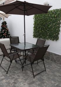 En terrasse eller udendørsområde på Suspiros de arica