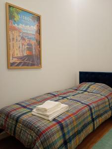 En eller flere senge i et værelse på BBGH Guest House