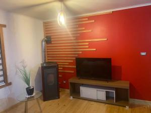 TV a/nebo společenská místnost v ubytování Entrevolcanes