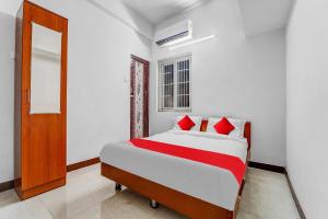 En eller flere senge i et værelse på Hotel O Crown Tower + 19 billeder