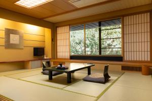 Телевизор и/или развлекательный центр в Shoenso Hozugawatei