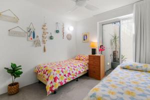 En eller flere senge i et værelse på Seaspray Unit 2, 21 Warne Tce, Kings Beach