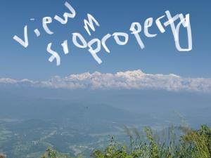 a view of a body of water with the words happy anniversary at Hotel Forest Side in Bandīpur