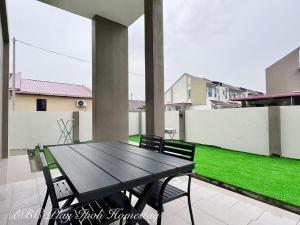 En balkon eller terrasse på BBC Play Ipoh Homestay